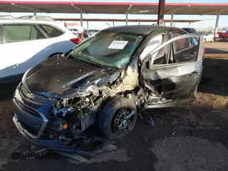 2017 Chevrolet Sonic LS z VIN 1G1JB5SG9H4172563, wystawiony jako IAAI lot #41398834 z przebiegiem Nie podano mil oraz . Historia ofert i sprzedaży dostępna na DreamBid. Obrazek 2.