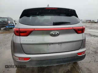 2018 Kia Sportage LX z VIN KNDPMCAC9J7318589, wystawiony jako Copart lot #59397595 z przebiegiem 107 523 mil mil oraz Szkoda całkowita • Salvage title. Historia ofert i sprzedaży dostępna na DreamBid. Obrazek 6.