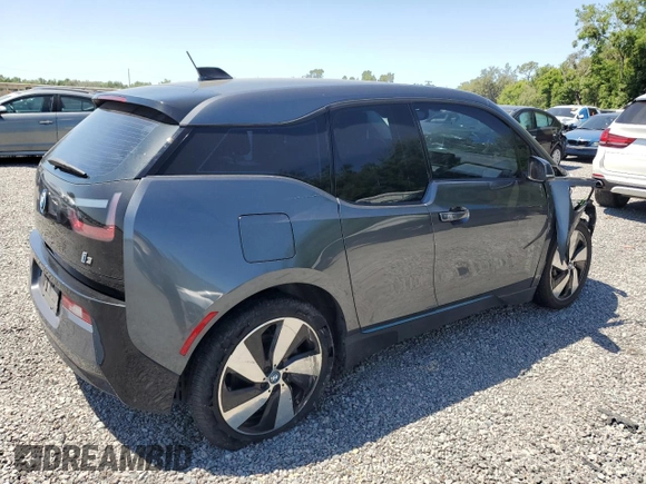 2017 BMW i3 with VIN WBY1Z8C5XHV551520, listed as a Copart auction lot 53878525 with 122,649 mi miles and Salvage Title. Bid and sale history available at carsss.com. Image 3.