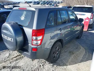 2007 Suzuki Grand Vitara with VIN JS3TE941974200708, listed as a IAAI auction lot 41589258 with 207,472 mi miles. Bid and sale history available at carsss.com. Image 4.