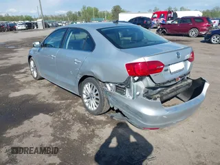 2014 Volkswagen Jetta TDI w/Premium with VIN 3VWLL7AJ2EM359341, listed as a IAAI auction lot 42030959 with 74,273 mi miles and . Bid and sale history available at DreamBid. Image 3.