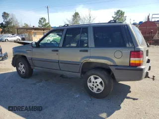 1995 Jeep Grand Cherokee Laredo with VIN 1J4GZ58S9SC706256, listed as a Copart auction lot 46635685 with 388,975 mi miles and Salvage Title. Bid and sale history available at carsss.com. Image 2.