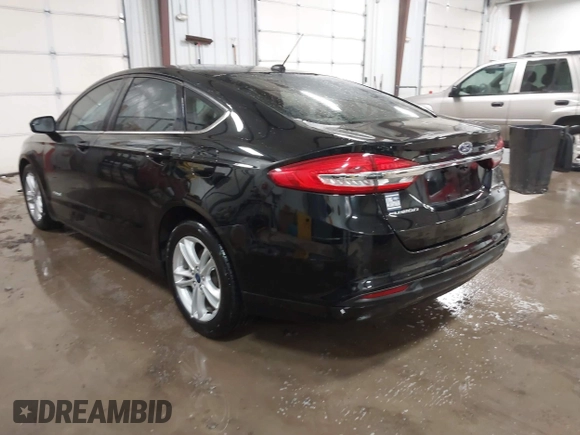 2018 Ford Fusion SE z VIN 3FA6P0LU3JR203864, wystawiony jako IAAI lot #41476335 z przebiegiem 49 246 mil mil oraz . Historia ofert i sprzedaży dostępna na DreamBid. Obrazek 3.