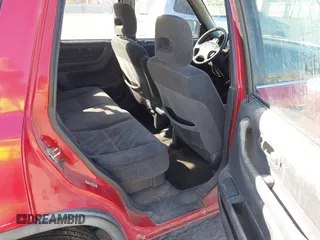 1999 Honda CR-V LX with VIN JHLRD2847XC009921, listed as a IAAI auction lot 41795325 with 268,638 mi miles. Bid and sale history available at carsss.com. Image 8.