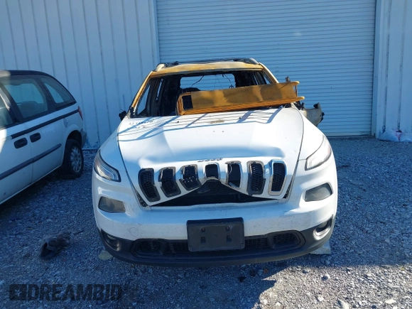 2014 Jeep Cherokee Altitude with VIN 1C4PJMCB5EW120946, listed as a IAAI auction lot 41348100 with Not Provided miles and . Bid and sale history available at DreamBid. Image 11.