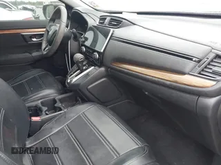 2017 Honda CR-V EX with VIN 7FARW1H59HE007171, listed as a IAAI auction lot 42033941 with 134,227 mi miles and . Bid and sale history available at carsss.com. Image 5.