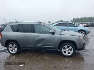 2014 Jeep Compass Latitude with VIN 1C4NJCEB2ED522109, listed as a IAAI auction lot 40282558 with 168,954 mi miles and . Bid and sale history available at carsss.com. Image 13.
