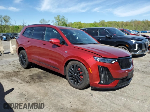 2024 Cadillac XT6 AWD Sport with VIN 1GYKPHRS4RZ715079, listed as a Copart auction lot 55297235 with 18,283 mi miles and Salvage title. Bid and sale history available at DreamBid. Image 4.