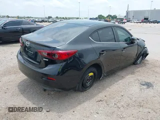 2016 Mazda 3 i Touring with VIN 3MZBM1V75GM241498, listed as a IAAI auction lot 42286147 with 102,655 mi miles and . Bid and sale history available at DreamBid. Image 4.