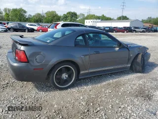 2004 Ford Mustang Standard with VIN 1FAFP40674F229138, listed as a Copart auction lot 56186445 with 128,566 mi miles and Salvage title. Bid and sale history available at DreamBid. Image 3.