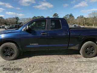 2012 Toyota Tundra 2WD Truck with VIN 5TFRM5F11CX041032, listed as a IAAI auction lot 41744471 with 207,330 mi miles. Bid and sale history available at carsss.com. Image 14.