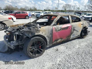 2022 Dodge Charger Scat Pack Widebody with VIN 2C3CDXGJ0NH210999, listed as a Copart auction lot 45121325 with Not Provided miles and Non Repairable. Bid and sale history available at DreamBid. Image 1.