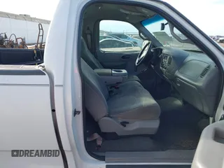 2001 Ford F-150 XL with VIN 3FTZF17241MA13884, listed as a IAAI auction lot 41406411 with Not provided miles and . Bid and sale history available at DreamBid. Image 5.