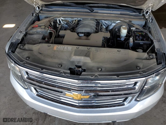 2018 Chevrolet Suburban Premier with VIN 1GNSCJKC7JR104888, listed as a Copart auction lot 68027604 with 69,632 mi miles and Salvage Title. Bid and sale history available at carsss.com. Image 12.