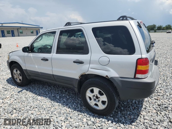 2003 Ford Escape XLT Popular with VIN 1FMYU03103KA06199, listed as a Copart auction lot 58731515 with 181,429 mi miles and Salvage title. Bid and sale history available at DreamBid. Image 2.
