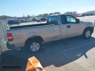 2007 Ford F-150 XL with VIN 1FTRF12257KB14262, listed as a IAAI auction lot 41709350 with 121,816 mi miles. Bid and sale history available at carsss.com. Image 4.