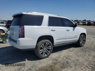 2020 GMC Yukon Denali with VIN 1GKS2CKJ0LR109590, listed as a Copart auction lot 68700384 with 55,310 mi miles and Salvage Title. Bid and sale history available at carsss.com. Image 3.