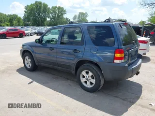 2006 Ford Escape XLT with VIN 1FMYU03156KA28848, listed as a IAAI auction lot 42670534 with 240,890 mi miles and . Bid and sale history available at DreamBid. Image 3.