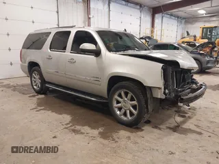 2011 GMC Yukon XL Denali z VIN 1GKS2MEF8BR338725, wystawiony jako IAAI lot #41238933 z przebiegiem 289 109 mil mil oraz . Historia ofert i sprzedaży dostępna na DreamBid. Obrazek 1.