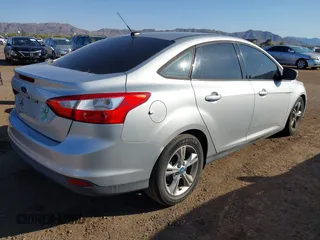 2013 Ford Focus SE with VIN 1FADP3F29DL153736, listed as a IAAI auction lot 42006149 with 176,935 mi miles. Bid and sale history available at carsss.com. Image 4.