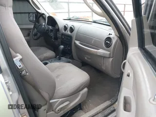 2004 Jeep Liberty Sport with VIN 1J4GL48K74W318861, listed as a IAAI auction lot 41706222 with 211,089 mi miles. Bid and sale history available at carsss.com. Image 5.