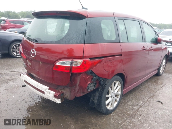 2012 Mazda 5 Grand Touring with VIN JM1CW2DL8C0142628, listed as a IAAI auction lot 42350676 with 84,764 mi miles and . Bid and sale history available at DreamBid. Image 16.