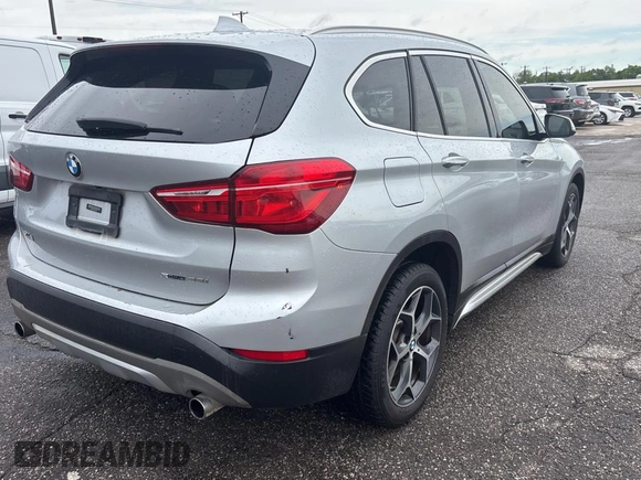 2018 BMW X1 sDrive28i with VIN WBXHU7C38J5L08773, listed as a Copart auction lot 55470955 with 149,885 mi miles and Clean Title. Bid and sale history available at DreamBid. Image 4.