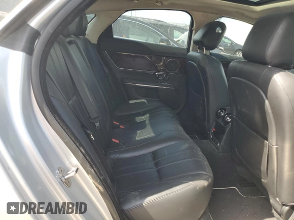 2015 Jaguar XJ with VIN SAJWJ1CD1F8V75232, listed as a Copart auction lot 57605685 with 146,314 mi miles and Salvage title. Bid and sale history available at DreamBid. Image 10.