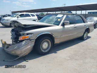 1997 Mercury Grand Marquis LS with VIN 2MELM75W3VX707138, listed as a IAAI auction lot 40055743 with 198,489 mi miles and . Bid and sale history available at DreamBid. Image 18.