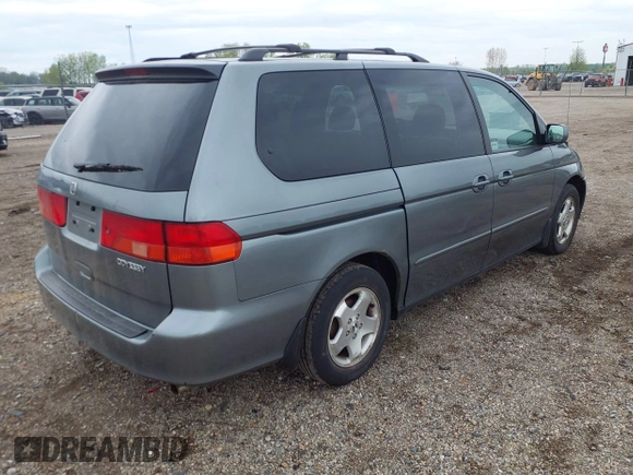 2000 Honda Odyssey EX z VIN 2HKRL1879YH516264, wystawiony jako IAAI lot #42109480 z przebiegiem 214 414 mil mil oraz . Historia ofert i sprzedaży dostępna na DreamBid. Obrazek 4.
