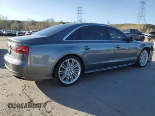 2017 Audi A8 z VIN WAU44AFD0HN010187, wystawiony jako Copart lot #54186365 z przebiegiem 78 095 mil mil oraz Szkody całkowita. Historia ofert i sprzedaży dostępna na DreamBid. Obrazek 3.