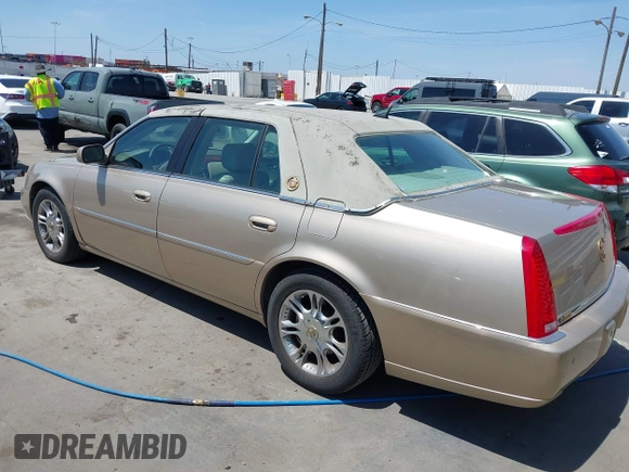 2006 Cadillac DTS w/1SC with VIN 1G6KD57Y26U112518, listed as a IAAI auction lot 42100747 with 122,149 mi miles. Bid and sale history available at carsss.com. Image 3.