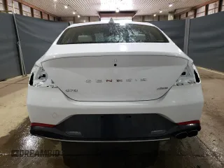 2023 Genesis G70 2.0T with VIN KMTG34TA9PU124418, listed as a Copart auction lot 60632694 with 23,798 mi miles and Salvage Title. Bid and sale history available at DreamBid. Image 6.