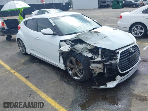 2013 Hyundai Veloster Turbo z VIN KMHTC6AE6DU112233, wystawiony jako IAAI lot #41869164 z przebiegiem 151 091 mil mil oraz . Historia ofert i sprzedaży dostępna na DreamBid. Obrazek 1.