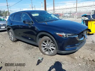 2020 Mazda CX-5 Grand Touring with VIN JM3KFBDM8L0807555, listed as a IAAI auction lot 41612906 with 40,518 mi miles. Bid and sale history available at carsss.com. Image 1.
