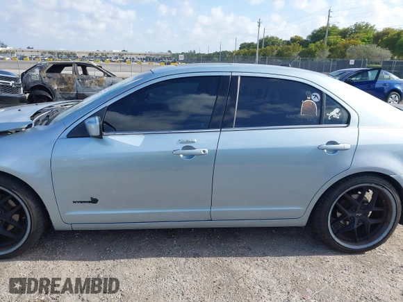2010 Ford Fusion Hybrid with VIN 3FADP0L35AR354431, listed as a IAAI auction lot 42107722 with 142,250 mi miles. Bid and sale history available at carsss.com. Image 14.
