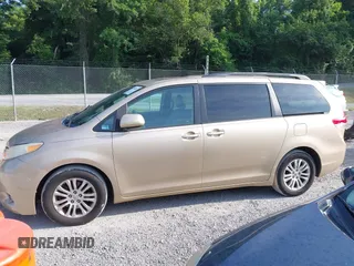 2011 Toyota Sienna XLE AAS with VIN 5TDYK3DC7BS008535, listed as a IAAI auction lot 42589645 with 208,624 mi miles and . Bid and sale history available at DreamBid. Image 14.