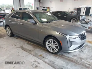 2021 Cadillac CT4 Luxury with VIN 1G6DA5RK4M0147723, listed as a IAAI auction lot 41646082 with 14,459 mi miles and . Bid and sale history available at DreamBid. Image 1.