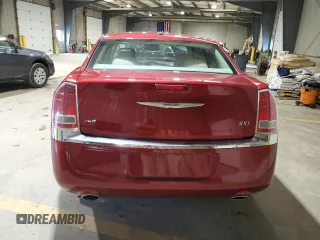 2014 Chrysler 300 z VIN 2C3CCARG9EH308723, wystawiony jako Copart lot #52051595 z przebiegiem 39 478 mil mil oraz Szkoda całkowita • Salvage title. Historia ofert i sprzedaży dostępna na DreamBid. Obrazek 6.