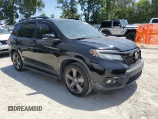 2019 Honda Passport Touring with VIN 5FNYF7H93KB004402, listed as a Copart auction lot 57576185 with 54,597 mi miles and Salvage title. Bid and sale history available at DreamBid. Image 4.