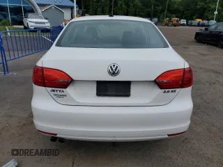 2013 Volkswagen Jetta SE z VIN 3VWDP7AJ0DM219473, wystawiony jako Copart lot #57700105 z przebiegiem 135 832 mil mil oraz Szkoda całkowita • Salvage title. Historia ofert i sprzedaży dostępna na DreamBid. Obrazek 6.