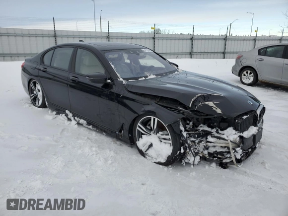 2017 BMW 7 Series 750i xDrive with VIN WBA7B0C55HG527046, listed as a Copart auction lot 41707455 with 15,947 mi miles and Salvage title. Bid and sale history available at DreamBid. Image 4.