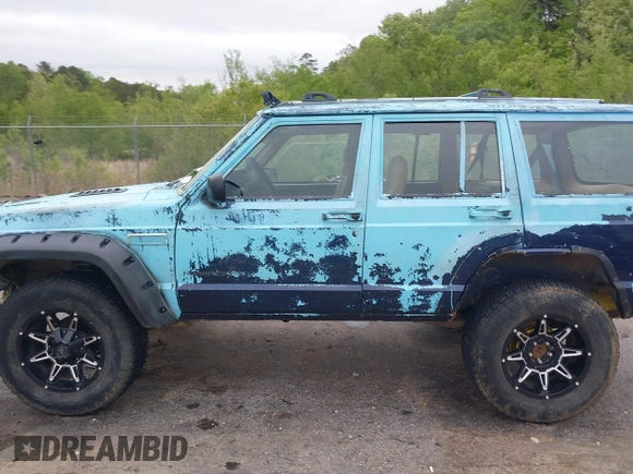 1997 Jeep Cherokee SE z VIN 1J4FJ28S3VL573144, wystawiony jako IAAI lot #41965201 z przebiegiem 298 276 mil mil oraz . Historia ofert i sprzedaży dostępna na DreamBid. Obrazek 14.