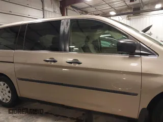 2006 Honda Odyssey LX with VIN 5FNRL38256B113667, listed as a IAAI auction lot 41856860 with 142,031 mi miles. Bid and sale history available at carsss.com. Image 14.