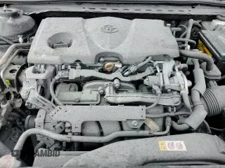 2020 Toyota Camry SE z VIN 4T1G11AK1LU977349, wystawiony jako Copart lot #85936825 z przebiegiem 65 735 mil mil oraz Czysty tytuł • Clean title. Historia ofert i sprzedaży dostępna na DreamBid. Obrazek 13.