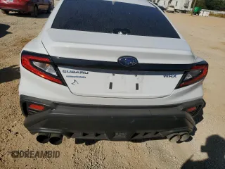 2023 Subaru WRX with VIN JF1VBAA66P9809569, listed as a Copart auction lot 76860074 with 19,786 mi miles and Salvage title. Bid and sale history available at DreamBid. Image 6.