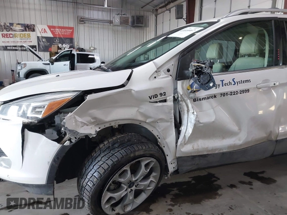 2016 Ford Escape Titanium with VIN 1FMCU9J94GUC79910, listed as a IAAI auction lot 41644467 with 43,261 mi miles. Bid and sale history available at carsss.com. Image 6.