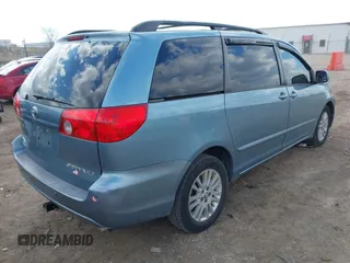 2007 Toyota Sienna XLE with VIN 5TDZK22C37S053965, listed as a IAAI auction lot 41902226 with 239,910 mi miles. Bid and sale history available at carsss.com. Image 4.
