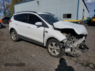 2014 Ford Escape SE with VIN 1FMCU9GX8EUC78133, listed as a Copart auction lot 51551275 with 167,019 mi miles and Salvage Title. Bid and sale history available at carsss.com. Image 4.