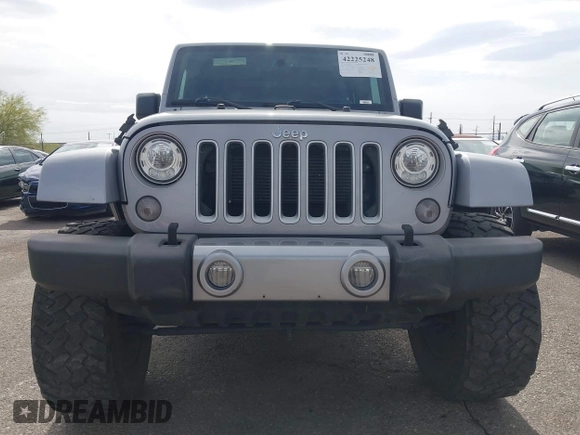 2018 Jeep Wrangler Unlimited Sahara with VIN 1C4BJWEG6JL817231, listed as a IAAI auction lot 42225248 with 68,015 mi miles and . Bid and sale history available at DreamBid. Image 13.